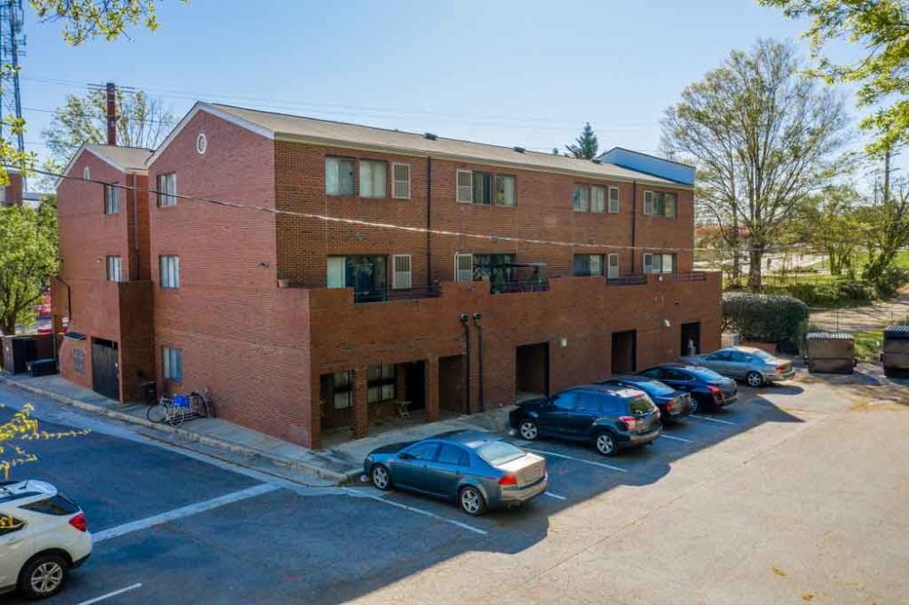 3116 hillsborough apartments near nc state university raleigh north carolina building exterior back of community building parking spots